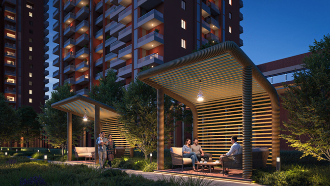 Estate 105 outdoor cabanas and residential towers at night
